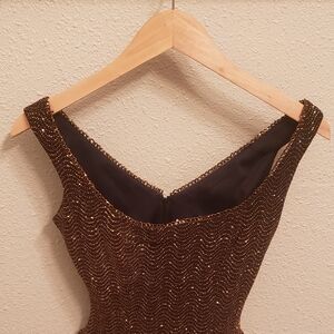 Size S,Cache, Dark Chocolate and Bronze top.